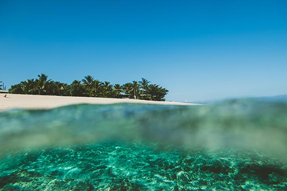 namotu-island-beach-and-resort-from-water