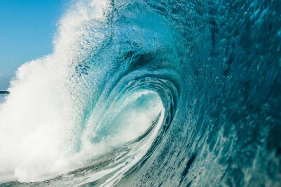 perfect-tube-wave-at-surf-break-near-namotu-island-fiji-banner